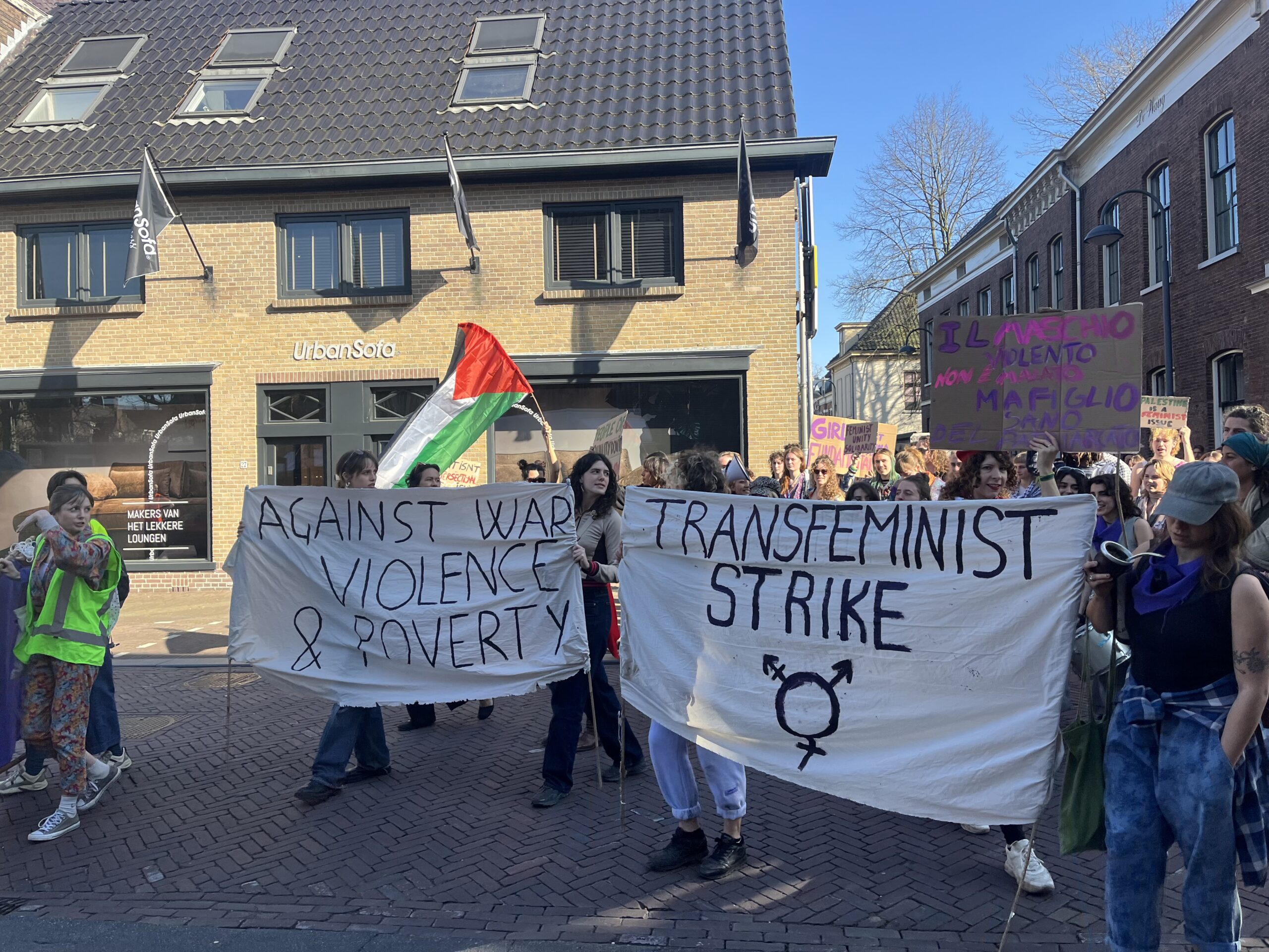 Students participate in Feminist March